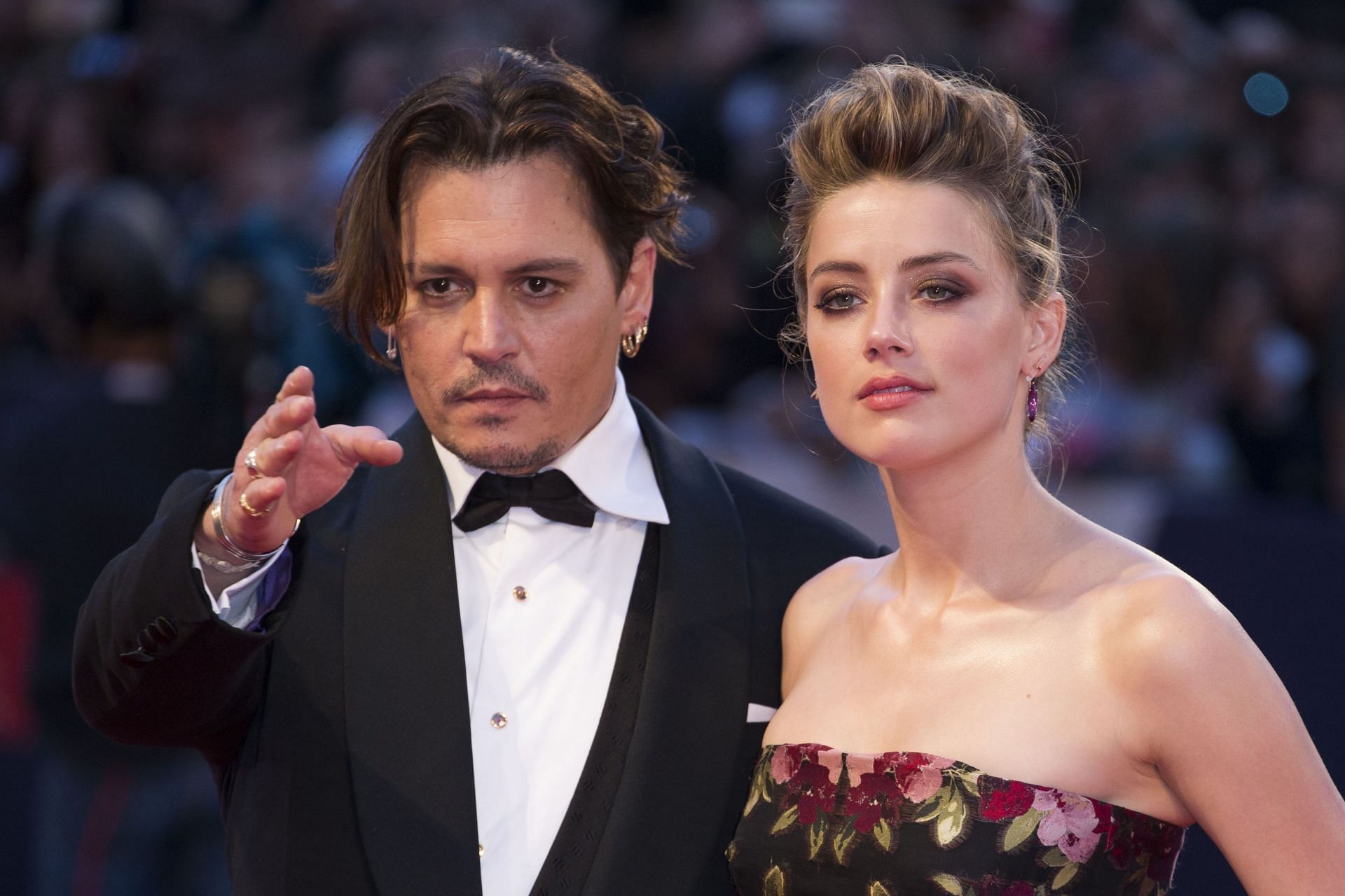 Johnny Depp and Amber Heard as seen at the premiere of The Danish Girl in 2015 (Image via Getty)
